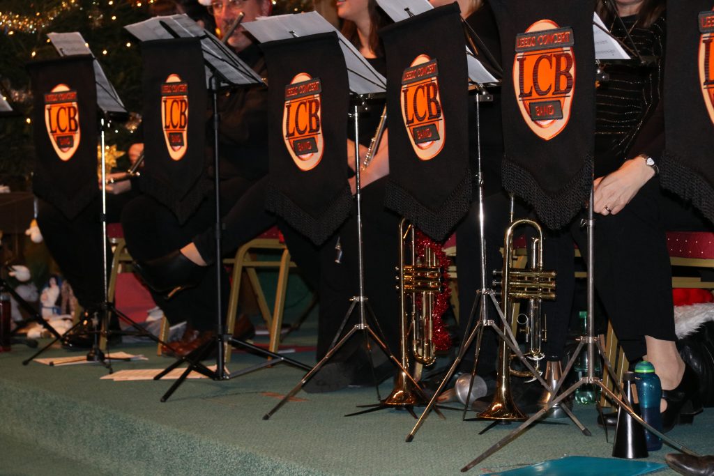 The black and orange stand banners of Leeds Concert Band
